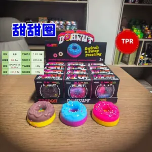 Squeezable donut shaped fidget toy with removable frosting