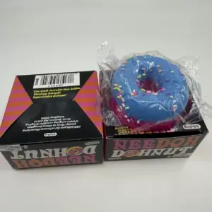 Black cardboard box packaging for donut stress toy