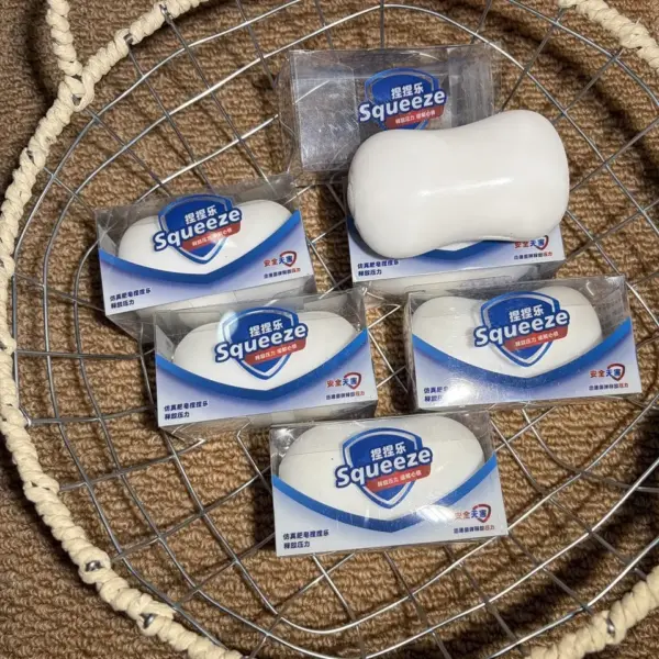 Scented foam soap squishy toy in the shape of a bar of soap, soft and slow-rising, for sensory play and stress relief.