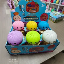 Golden Glitter Bread Squishy Toy – Soft Sensory Stress Relief Toy with Popping Beads Product Image