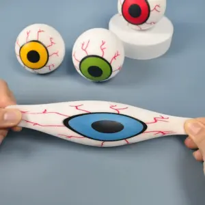 Yellow cartoon eye squeeze ball fidget