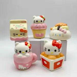 Kawaii cat character with pink bows and blush cheeks next to cupcake and doughnut shapes