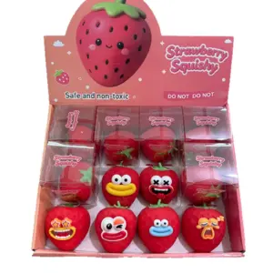 Upper-row strawberry squishy toys in individual clear plastic packaging