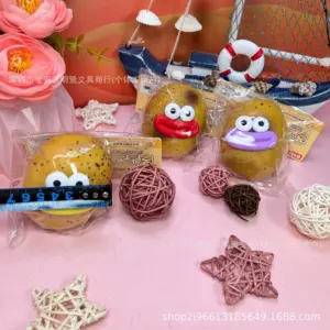Display box of 12 individually wrapped potato squeeze toys with colorful lips