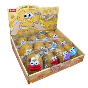 Open display box showing rows of potato squishy toys in clear wrappers