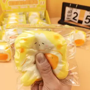 Multiple toast bread squishy toys individually packaged in clear plastic bags with yellow header cards