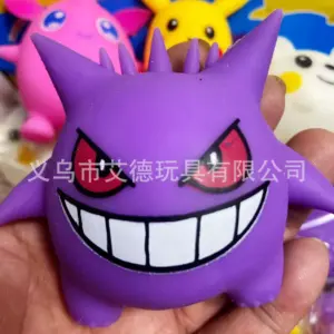 Pink figure with large blue eyes and curved smile