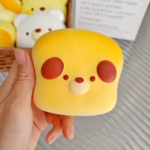 Collection of yellow and white squishy toys with animal ears